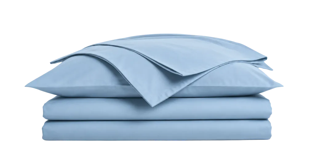 A stack of folded light blue bed linen